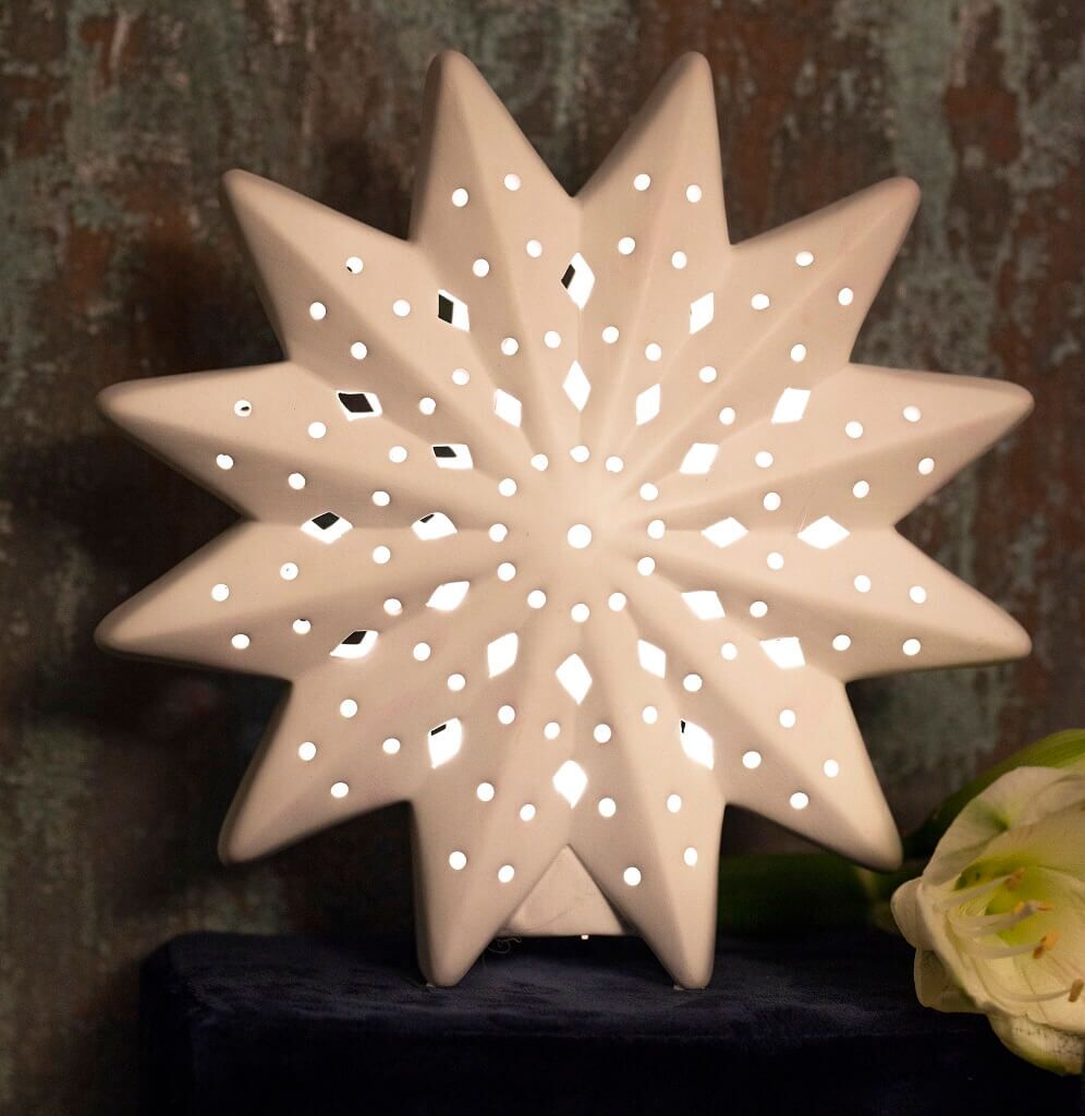 Leona-einzeln-viele-Cut-Outs Sternlampe Leona 23cm 12 Zacken LED