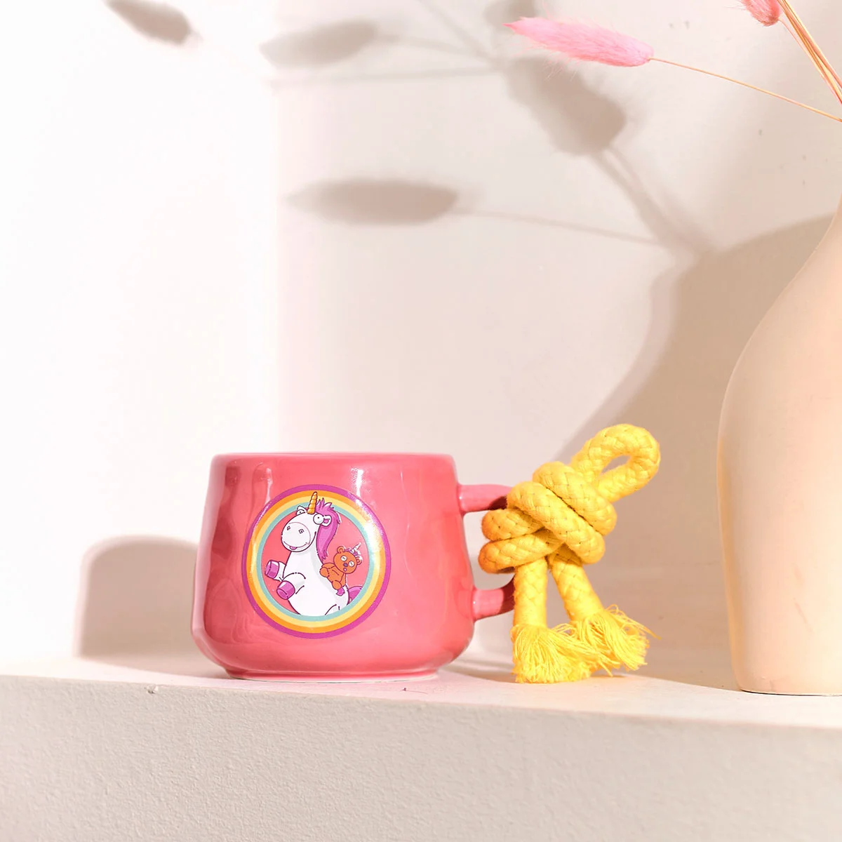 Fluffy - Minions™ Duftkerze 200g in Tasse mit Kordel